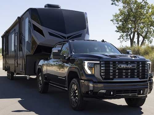 2024 GMC Sierra HD towing a camper